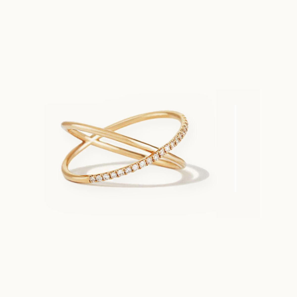 Gold crossover X ring with one pavé-set band