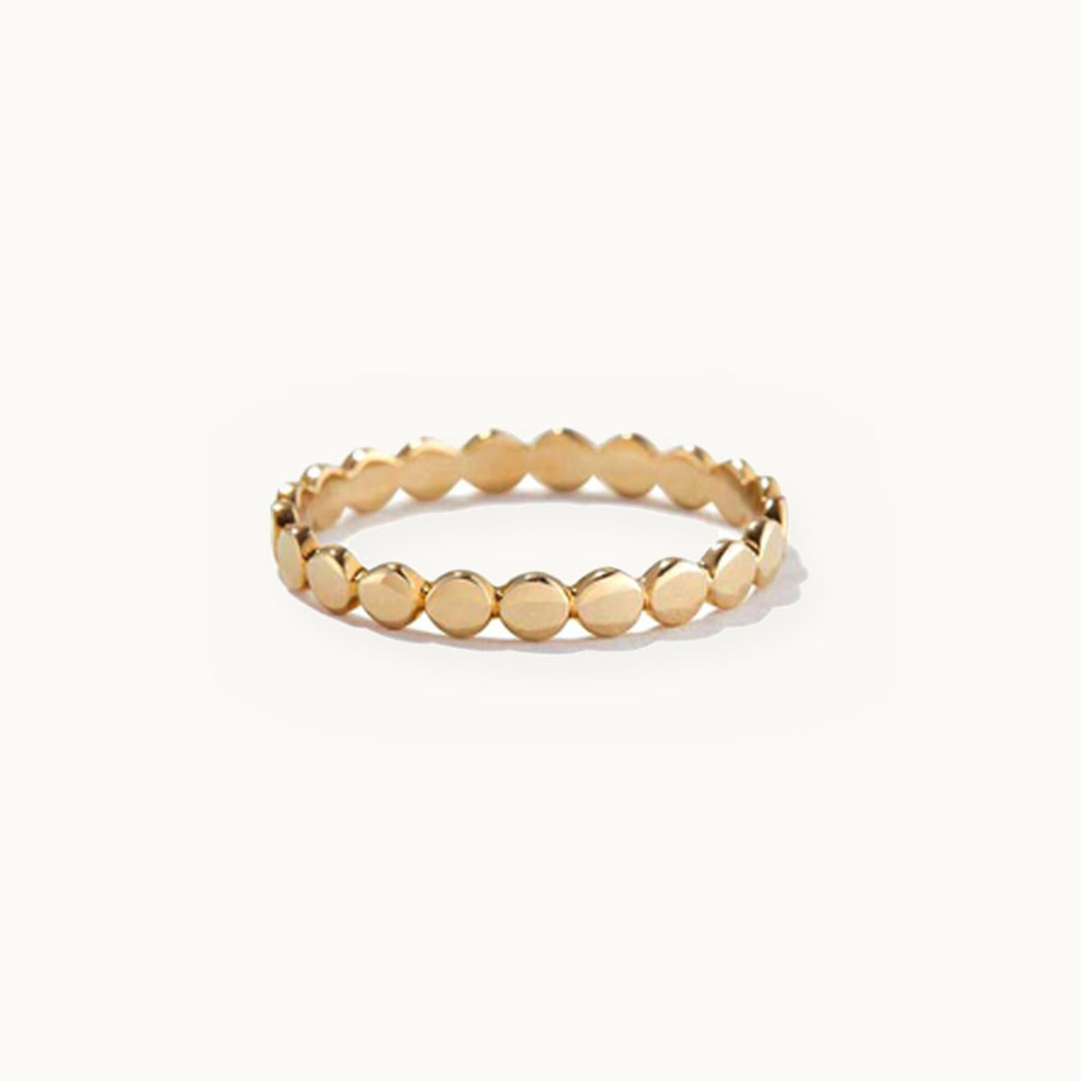 Gold band ring made of smooth linked discs