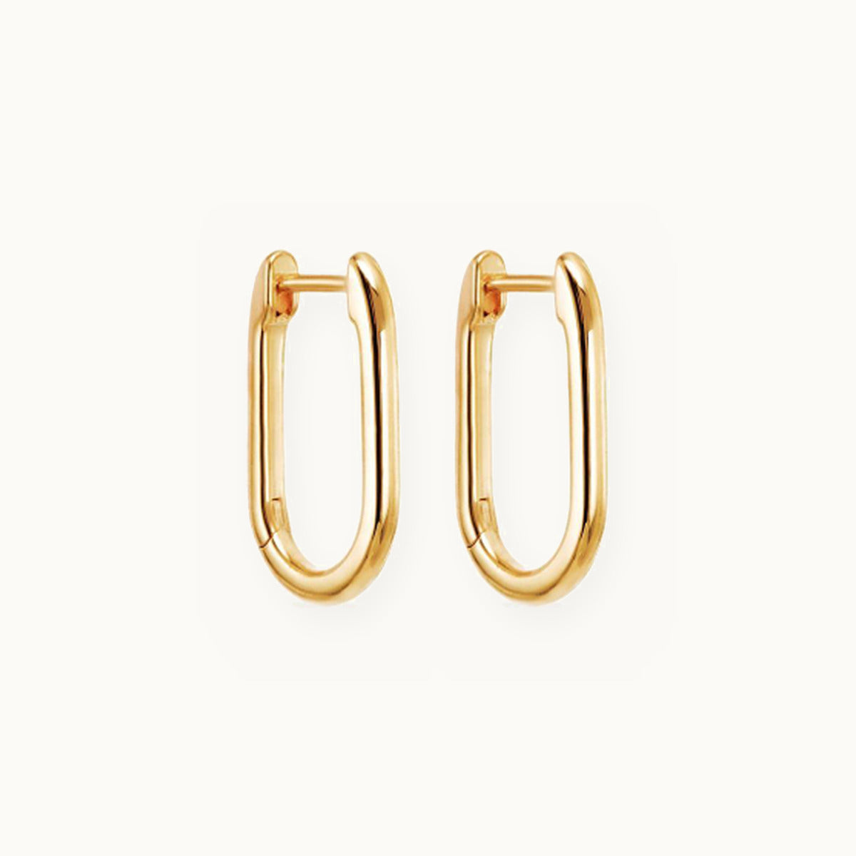Pair of elongated oval gold hoop earrings