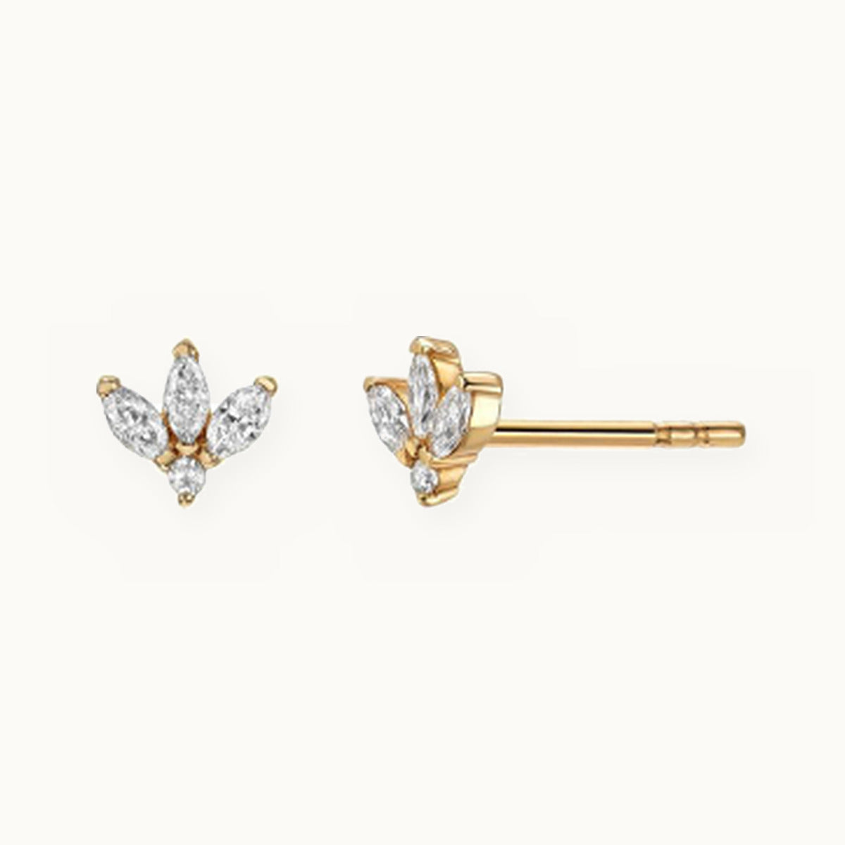 Pair of gold stud earrings with three marquise stones